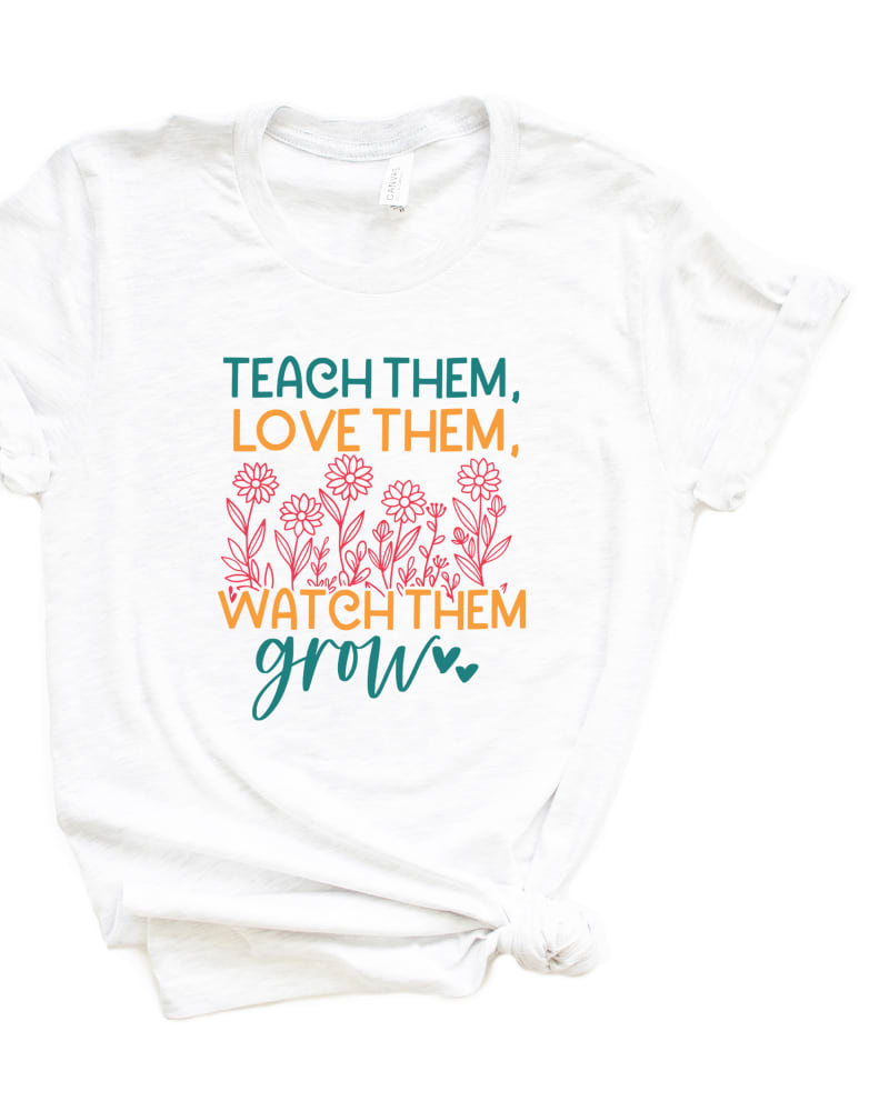 Front of a model wearing a size L Watch Them Grow Flower Garden Short Sleeve Graphic Tee in White by Simply Sage Market. | dia_product_style_image_id:301177